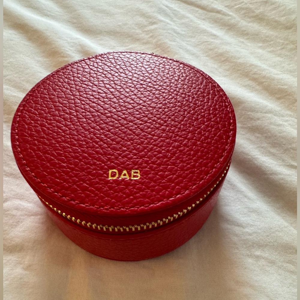 Round red jewelry travel case
